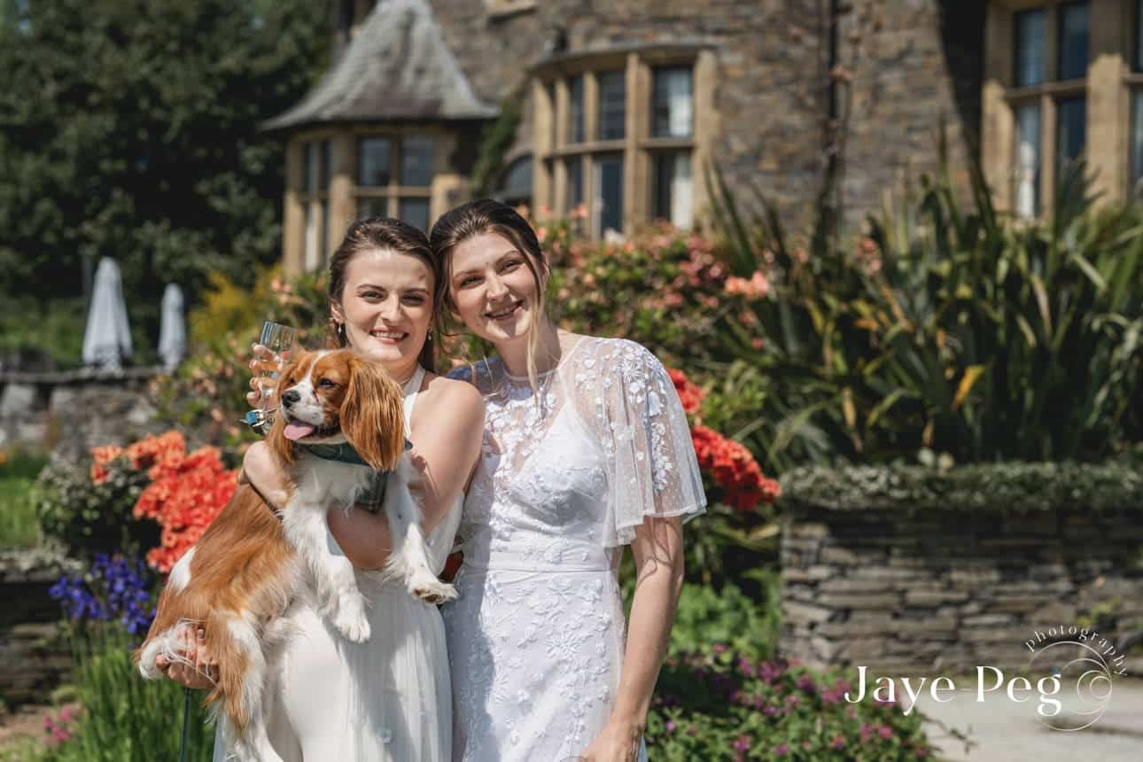 two brides and their dog at cragwood country house hotel