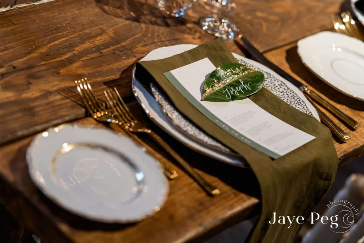 a place setting on a wedding table