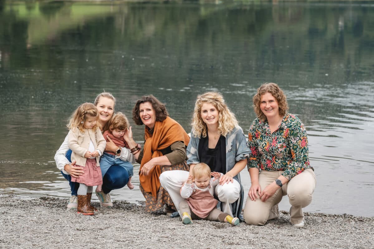 a family photo on the shore of grasmere